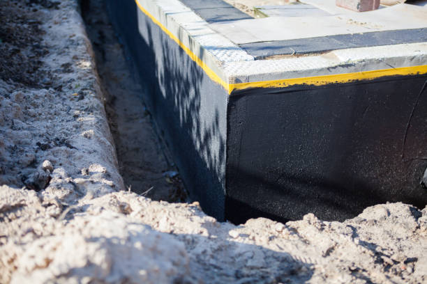 Professional Waterproofing technician working in Eastaboga, AL